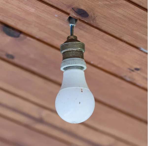 Light bulb from the ceiling — Stock Photo, Image