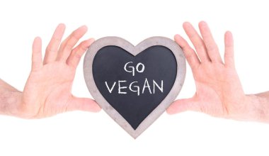 Yetişkin tutan kalp şeklinde tebeşir - Vegan git