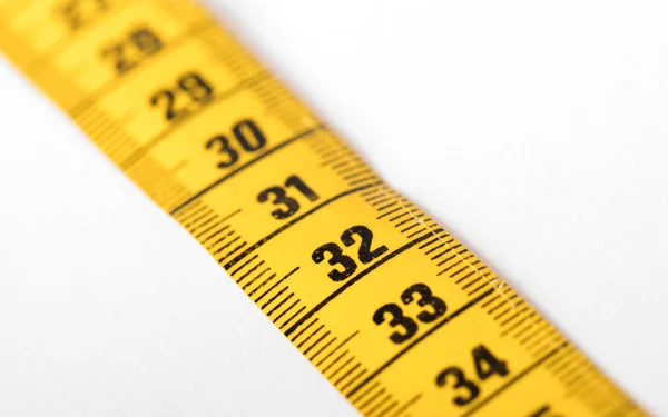Measuring tape, selective focus on 32 — Stock Photo, Image