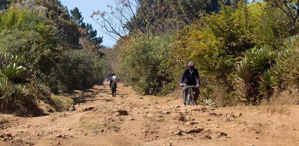 Old man walking on a bad road on Madagascar — Stock Photo, Image
