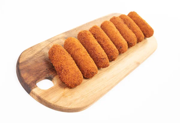 Bruine Kroketten Een Dienblad Geïsoleerd Een Witte Achtergrond — Stockfoto