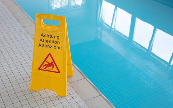 Wet Floor Sign Indoor Swimming Pool Selective Focus Stock Image