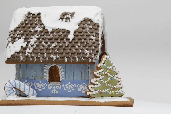 Christmas sweet gingerbread houses with different shapes for Christmas holidays, delicious sweet cookies