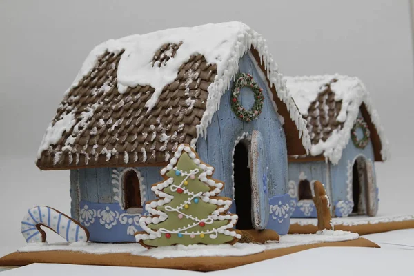 Christmas sweet gingerbread houses with different shapes for Christmas holidays, delicious sweet cookies