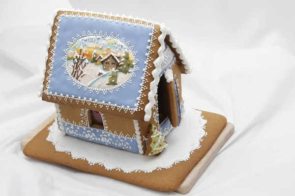 Christmas sweet gingerbread houses with different shapes for Christmas holidays, delicious sweet cookies