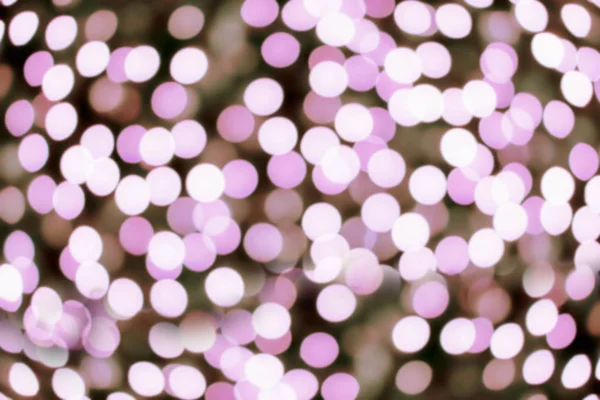 Blurred and bokeh pink led lighting in full screen background.
