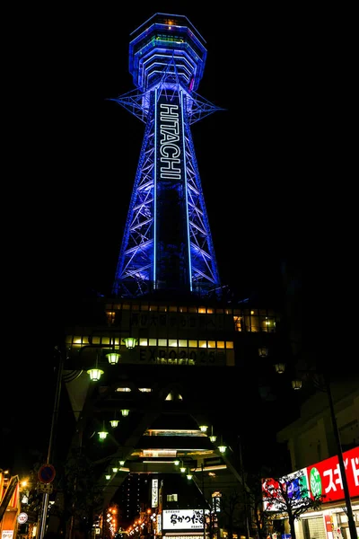 2019年1月14日 日本大阪 筑地塔 带有蓝色霓虹灯和日立文字的白色霓虹灯 夜间背景 筑地是大阪的一座塔楼和地标 总高度为103米 — 图库照片