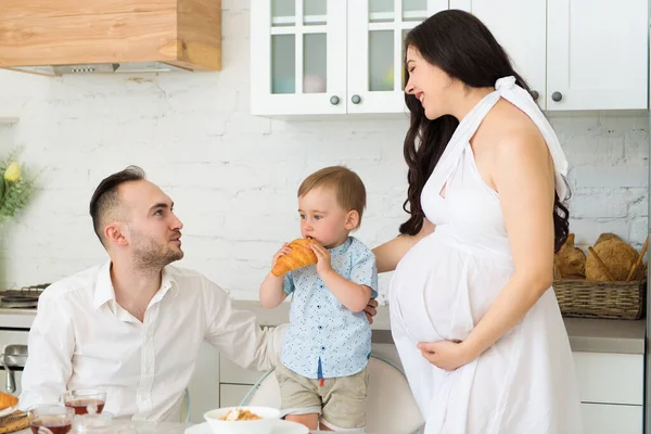 Happy Family Home Kitchen Married Couple Small Child Pregnant Woman — Stock Photo, Image