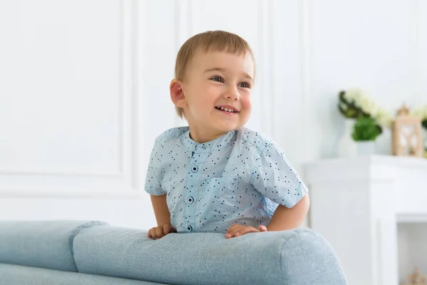Portrait Little Smiling Boy Child Playing Sofa Living Room — Stock Photo, Image