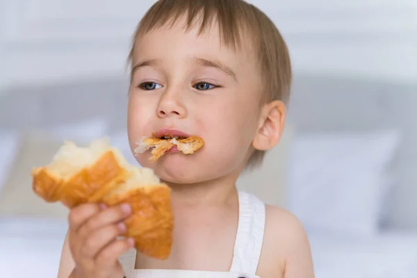 Happy Portrait Little Smiling Boy Child Playing Eating Croissant — Stock Photo, Image
