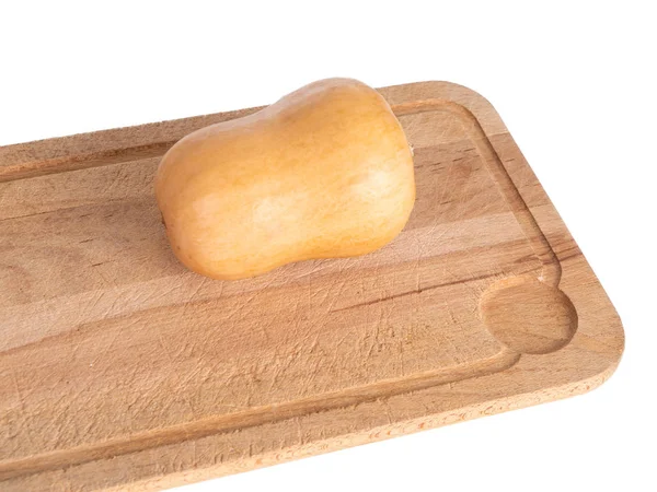 Mini butternut pumpkin on a cutting board — Stock Photo, Image