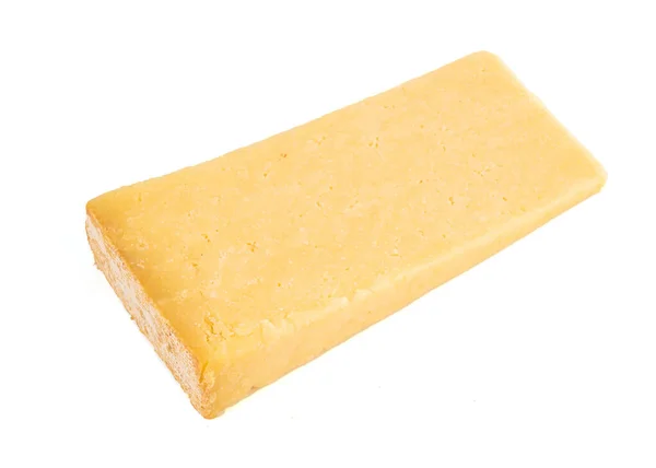 白い背景にフランスの牛のミルクチーズカンタル — ストック写真