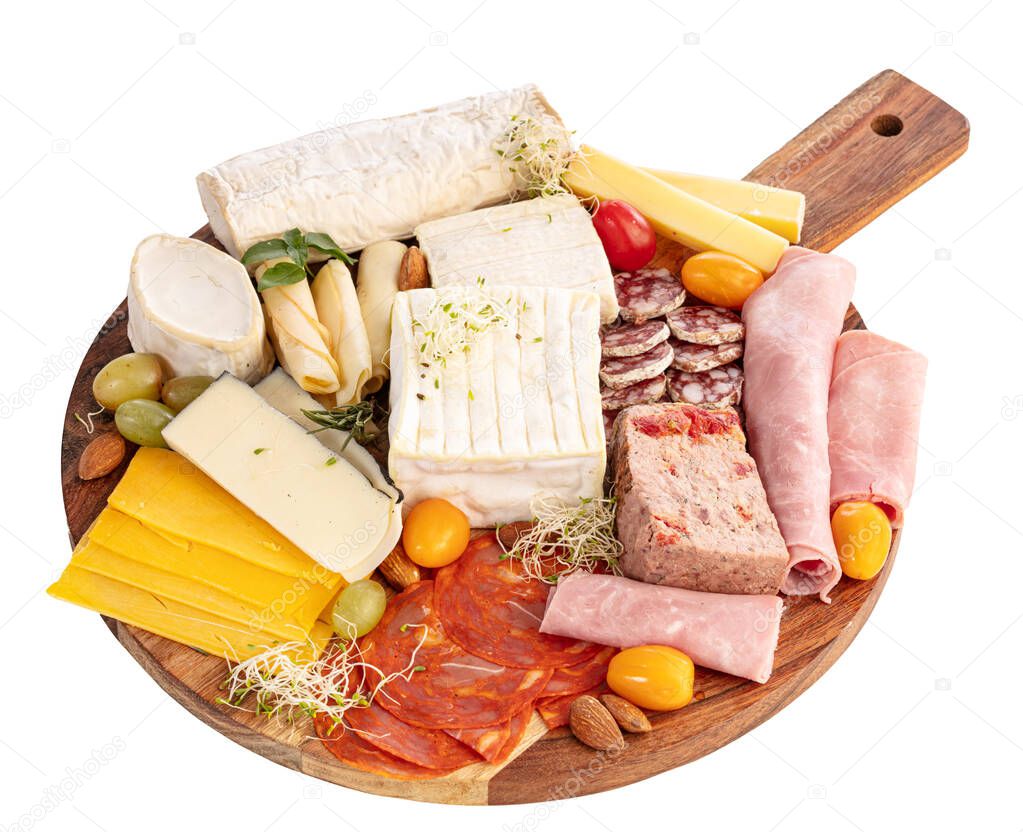 Assortment of cheese and cold meats on white background