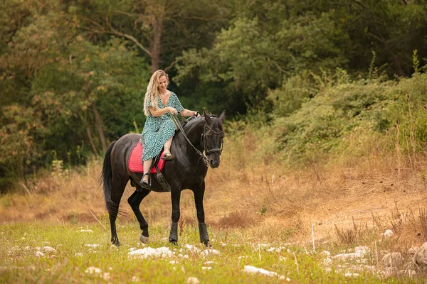 Woman Dress Rides Amazon Black Horse Wilderness — Stock Photo, Image