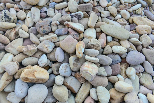 Zbliżenie Zaokrąglonych Polerowanych Skał Tropikalnej Plaży — Zdjęcie stockowe