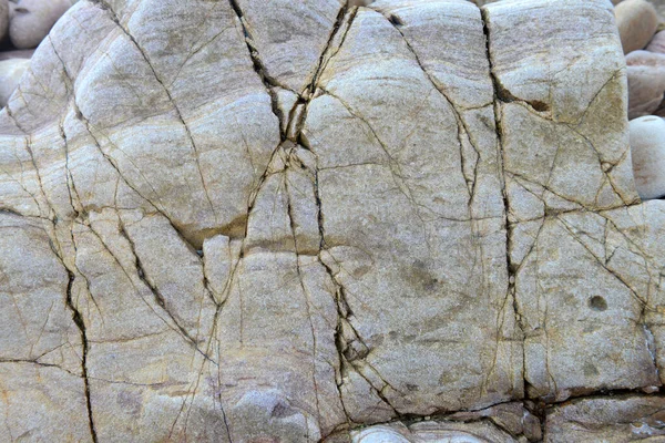 Sahildeki Taşın Dokusu Arkaplanı Için Yakınlaşması — Stok fotoğraf