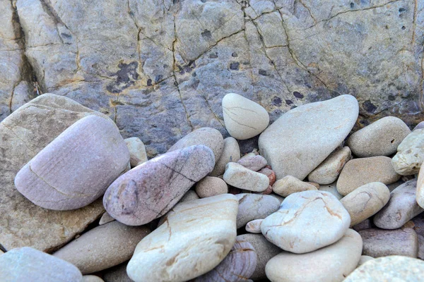 Close Pequenas Rochas Arredondadas Sobre Fundo Pedra — Fotografia de Stock