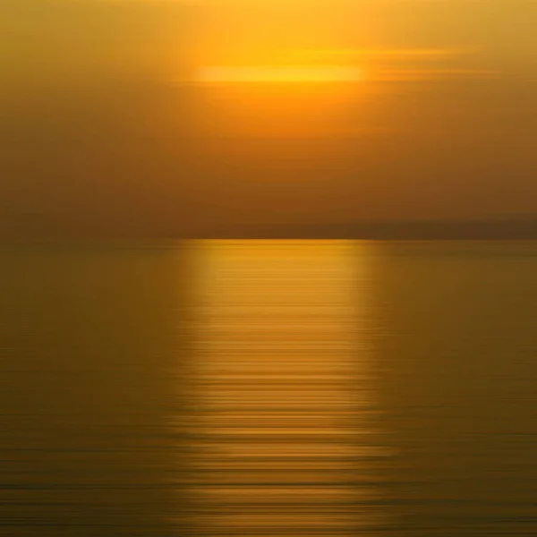 Abstrakcyjny Ruch Tła Zamazany Załamaniem Wodzie Zachodem Słońca Nad Morzem — Zdjęcie stockowe