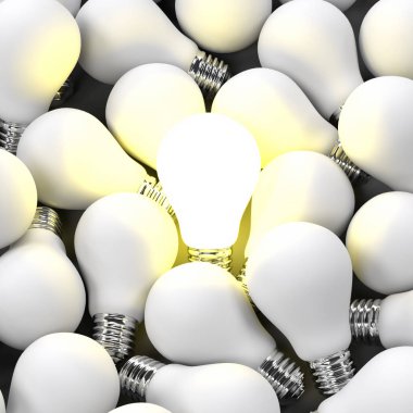 Bir grup ortasında parlayan bir ampul odaklanmak