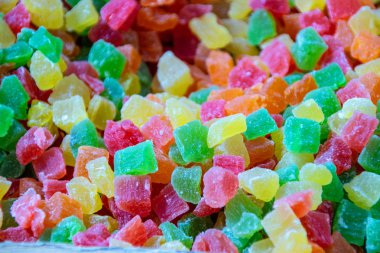 Arka plan renkli meyve şekerli. Ananas parçaları.