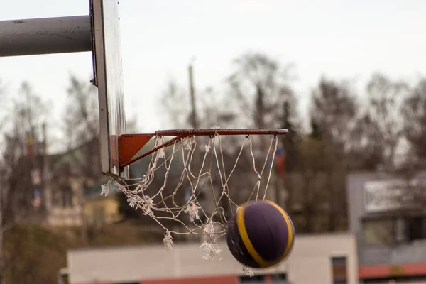 Basketball ring with a flying ball — Stock Photo, Image