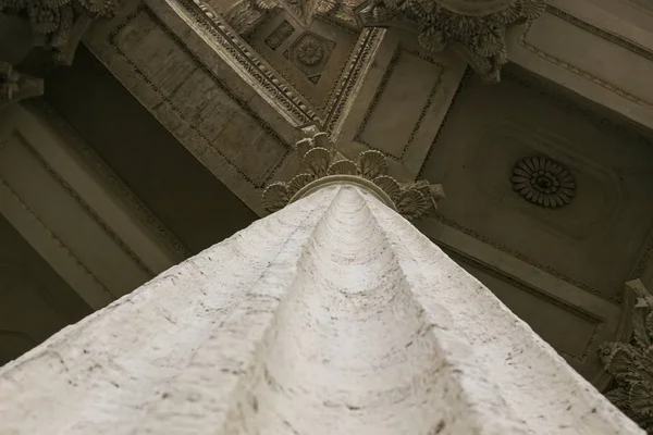 classic antique architecture marble columns enter to palace symmetry foreshortening from below