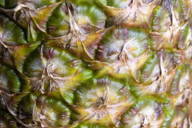 Makro fotoğraf gıda tropikal meyve ananas. Ananas palmiye ağacının doku arka plan olgun sulu meyveler. Ürün görüntüsü tropikal meyve ananas