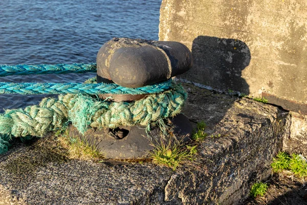 The cable is tied to the pier