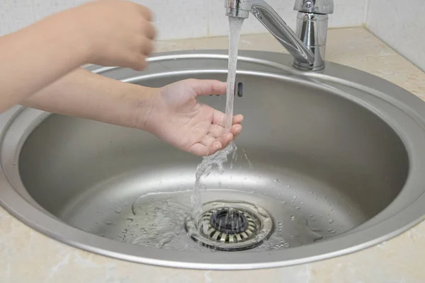 Little girl washes hands in the bathroom — Stock Photo, Image