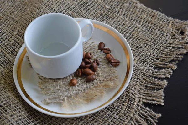 Coffee Beans White Plate Burlap — Stock Photo, Image