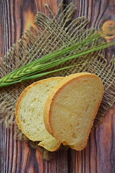 Fresh Bread Wicker Basket Green Ears Wooden Background — Stock Photo, Image
