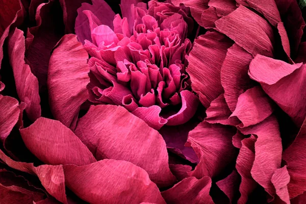 Red flower background.Three-dimensional flowers made of paper.