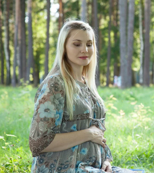 Thoughtful Pregnant Young Woman Sitting Lawn Green Summer Park — Stock Photo, Image