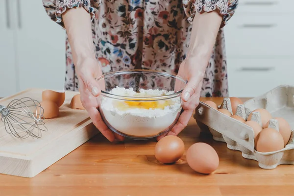 Young beautiful girl making dough — Stock Photo, Image