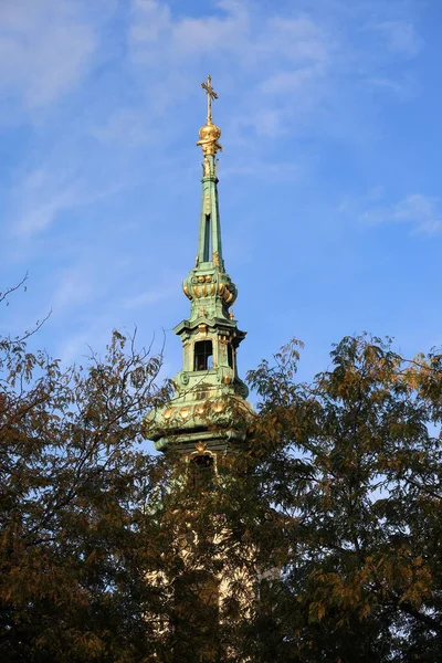 Autumn view of the Stiftskirsche tower — Stock Photo, Image