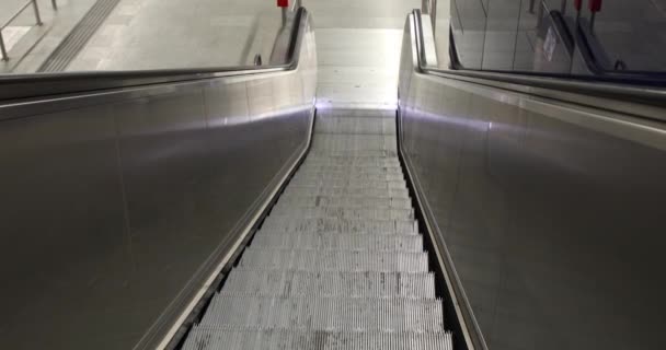 Vienna, Austria - 15 September 2019: Going down the escalator — Stock Video