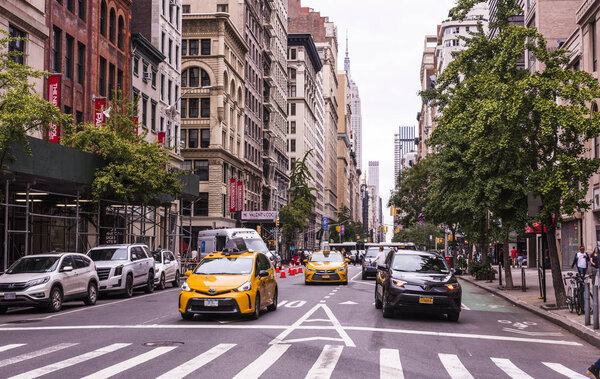 NEW YORK, USA - September 23, 2018: FIFTH AVENUE (5th Ave) is the most famous street of New York. 5th AVE is best known as an unrivaled shopping street. Manhattan, New York City, USA.