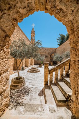 Mor Gabriel Monastery in Midyat, Mardin. Turkey. Mor Gabriel Monastery is the oldest surviving Syriac Orthodox monastery in the world. clipart