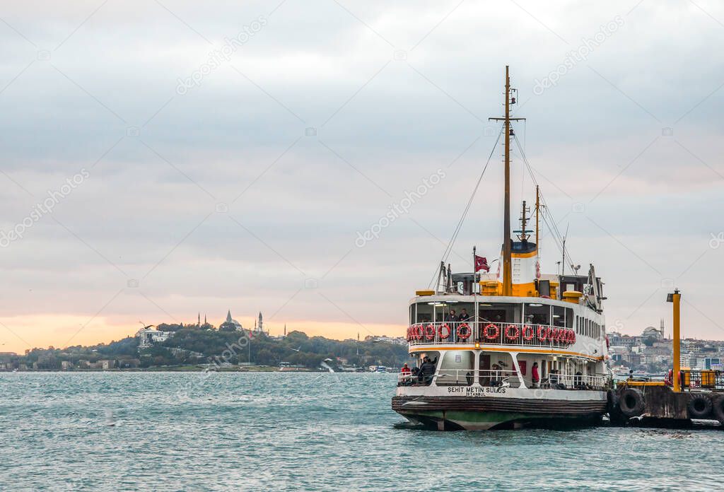 ISTANBUL, TURKEY - November 1, 2015:  People get on board the ship at Besiktas. Istanbul, Turkey.