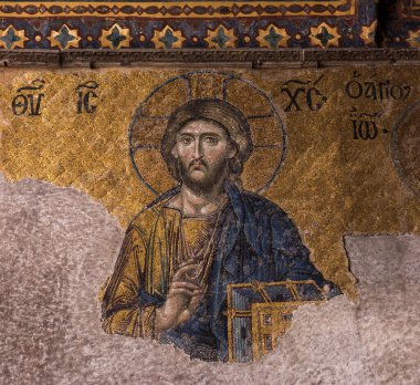 ISTANBUL - NOVEMBER 26, 2016: Mosaic of Jesus Christ a Byzantine mosaic in the interior of Hagia Sophia. Istanbul, Turkey. A Byzantine mosaic of 13th century. clipart