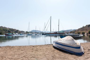 Gumusluk (Myndos), Bodrum 'da bir sahil köyü ve balıkçı limanı. Mugla, Türkiye.
