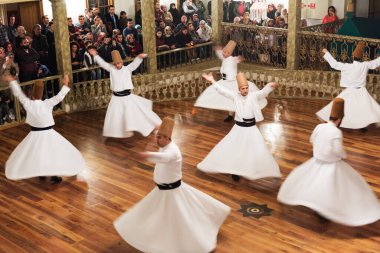 ISTANBUL, TURKEY - OCTOBER 20, 2016: Semazen, Dervishes. Whirling Dervishes Ceremony in Istanbul, Turkey. Mevlana Dervish Dancing. clipart