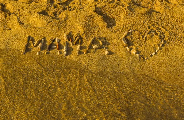 plaj üzerinde yazıt