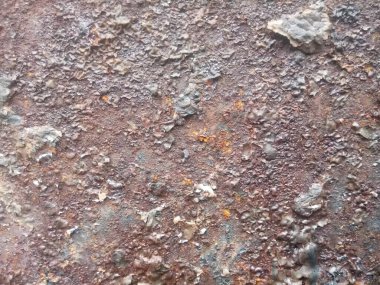 Eski boya kalıntılarıyla birlikte metal desen paslı demir levha.