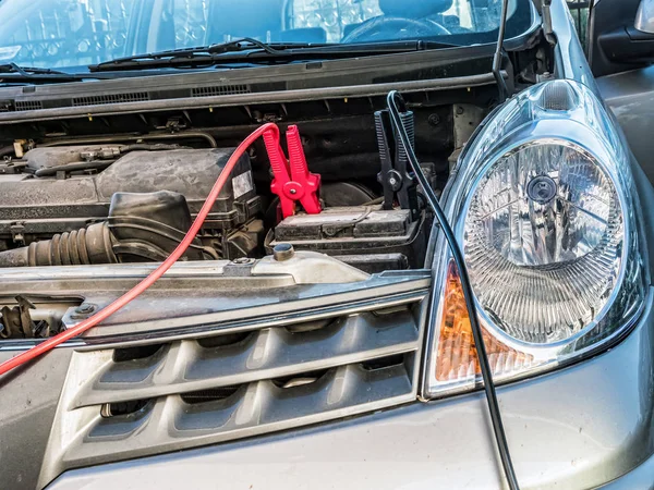 Car Battery Being Charged Two Jumper Cables Clipped Terminals — Stock Photo, Image