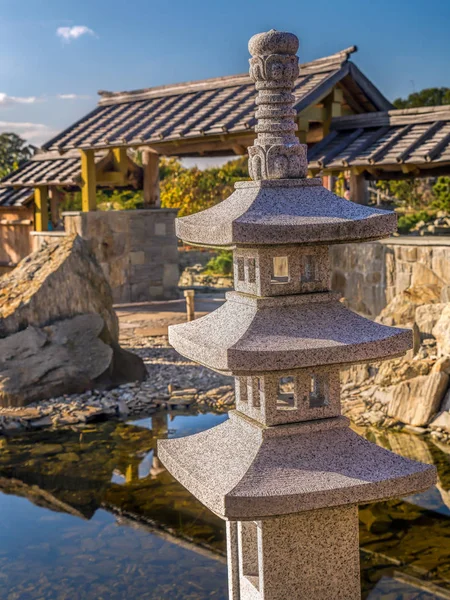Typical Japanese rock garden with little shrine
