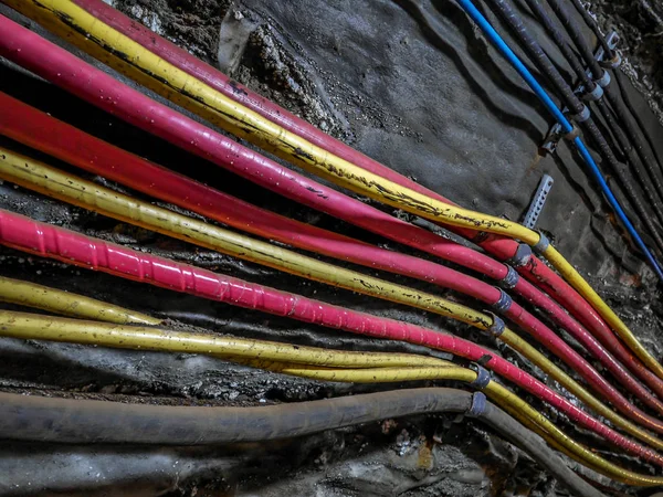 Power cables bundle in old salt mine — Stock Photo, Image
