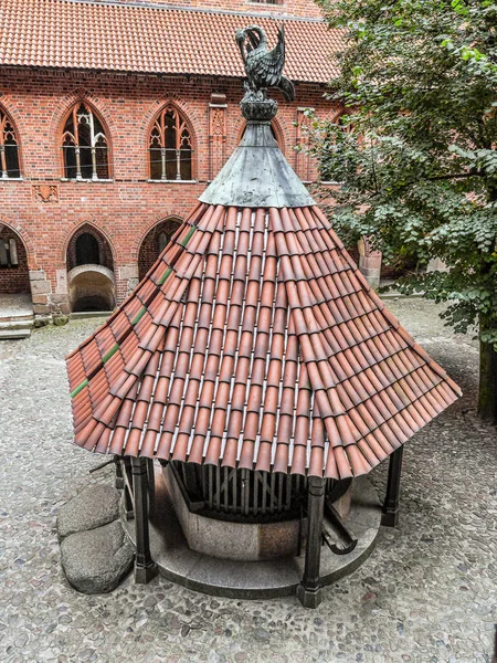 Old well in Malbork castle — Stock Photo, Image