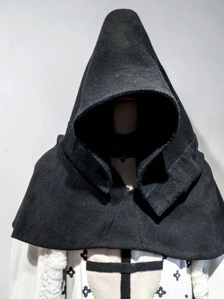 Teutonic order robe with hood exhibited in Malbork castle museum, Poland — Stock Photo, Image