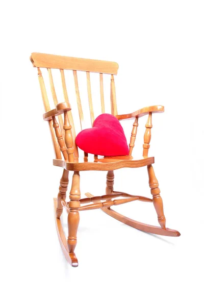 빨간 듣기 베개와 흔들 의자 — 스톡 사진